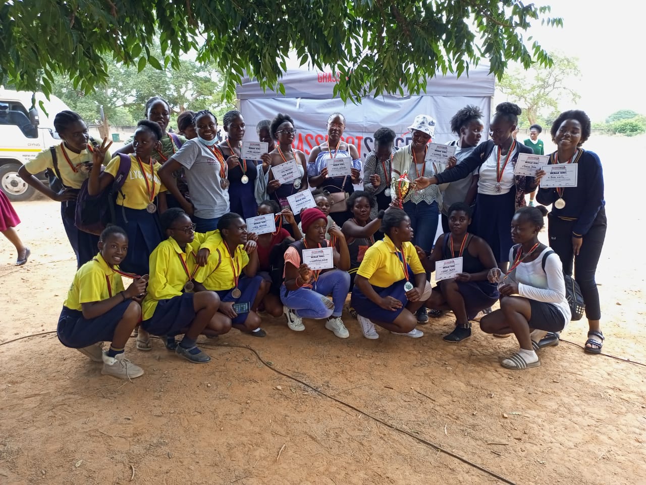 a group of girls at the SKILLZ graduation